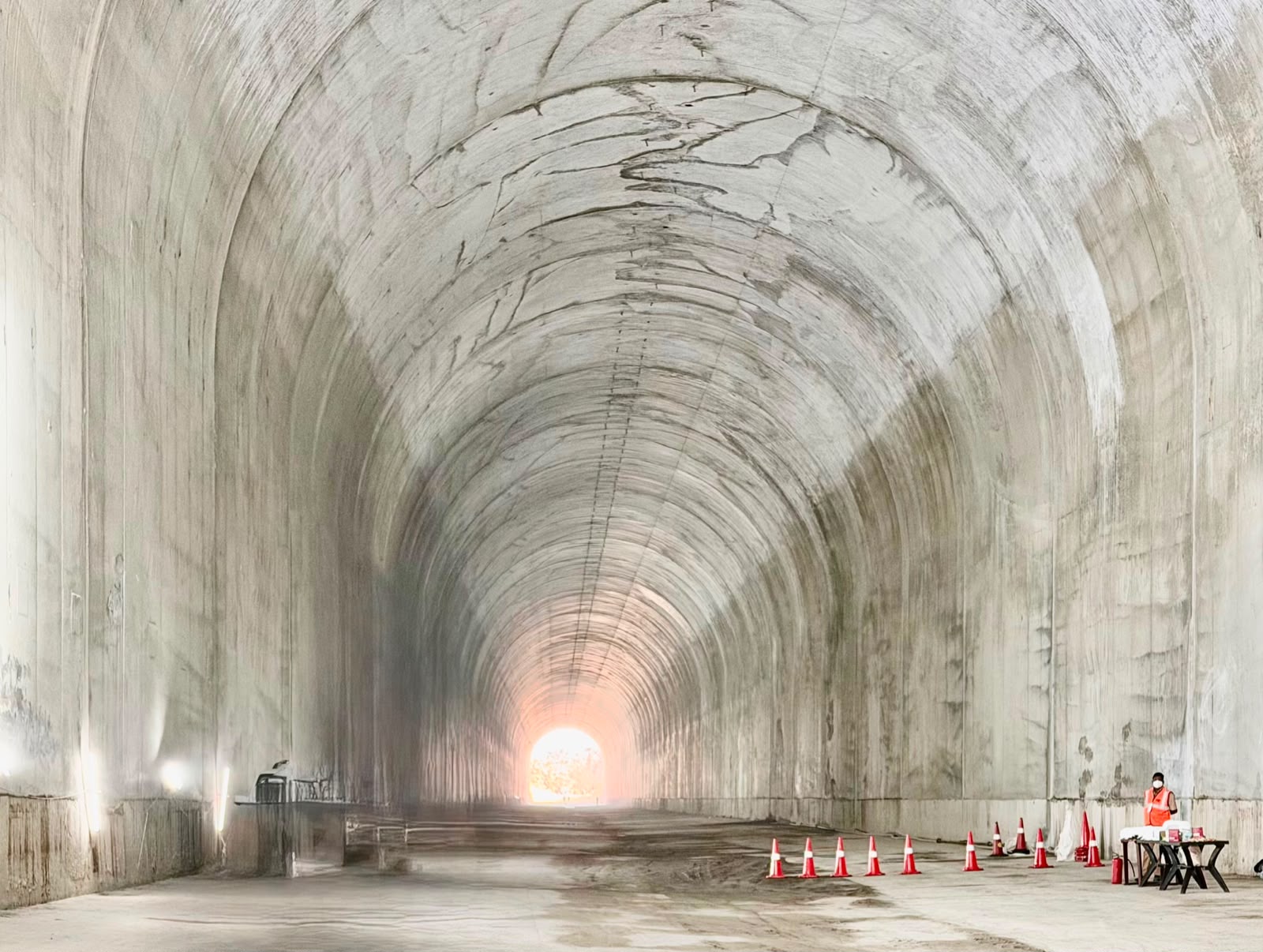 Concrete-lined twin tunnel bore with daylight at the far portal, Polavaram