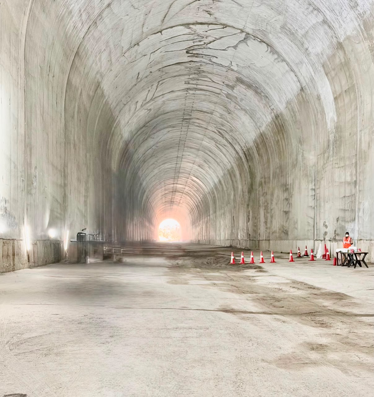 Concrete-lined tunnel bore with daylight at the far portal, Polavaram